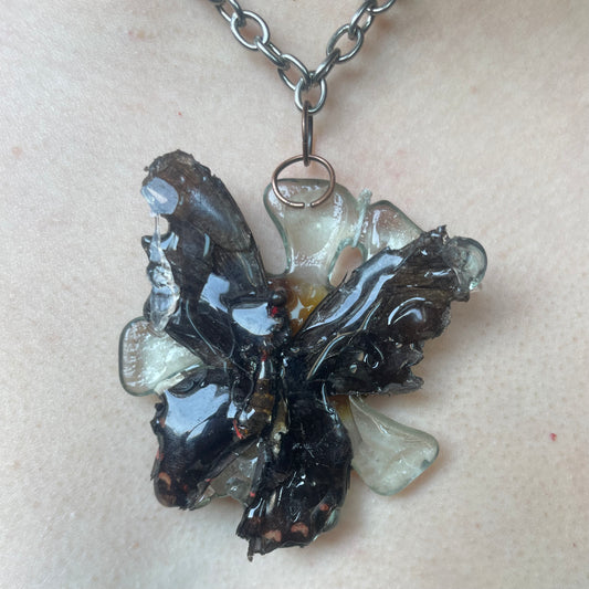 resined butterfly on recycled glass necklace