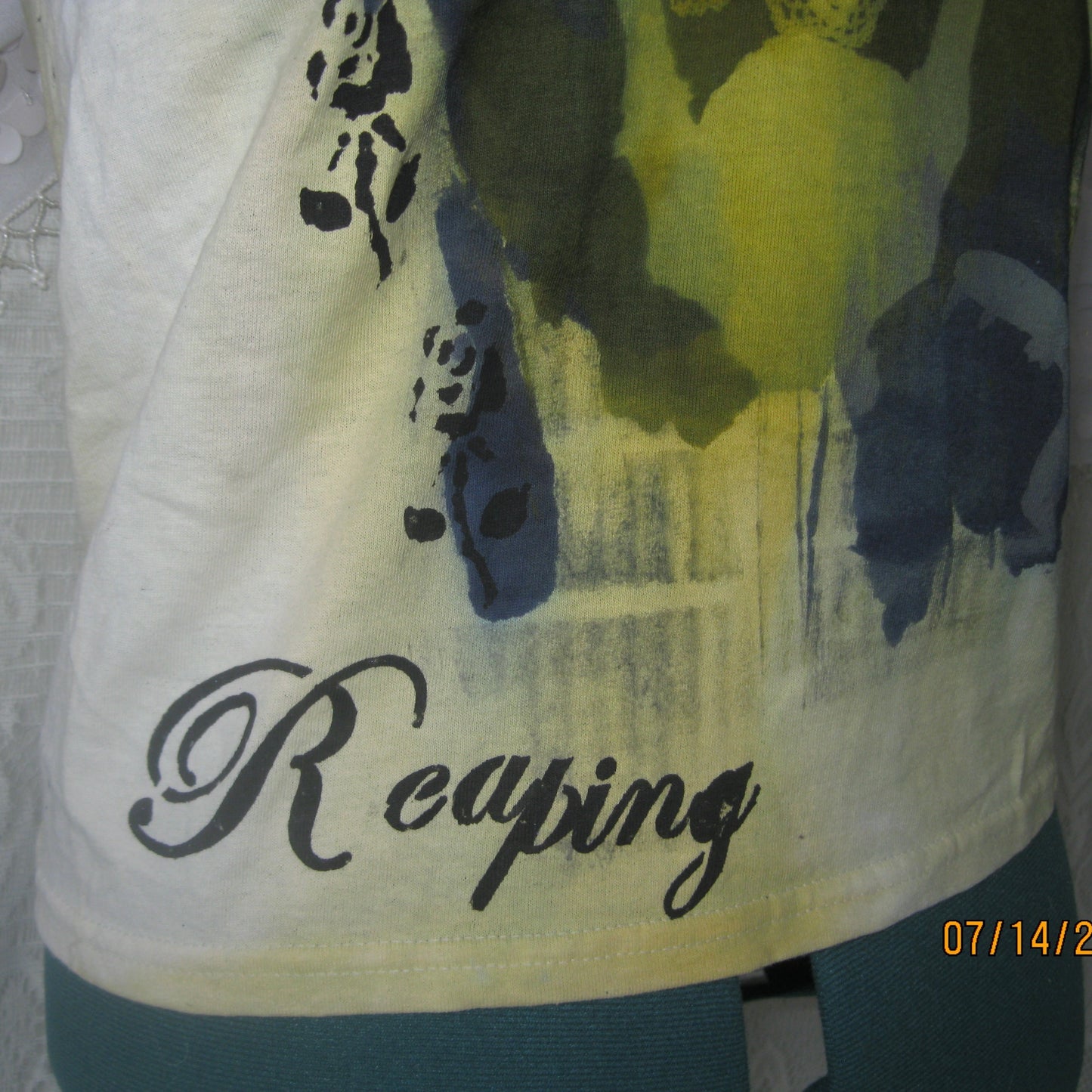 small reaping baby tee